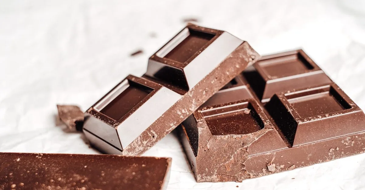 A broken bar of dark chocolate